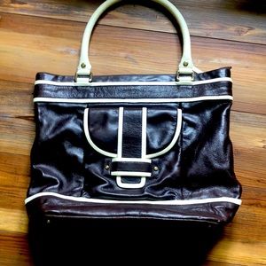 Kate Spade brown tote. Brown zebra inside lining.Barely used.